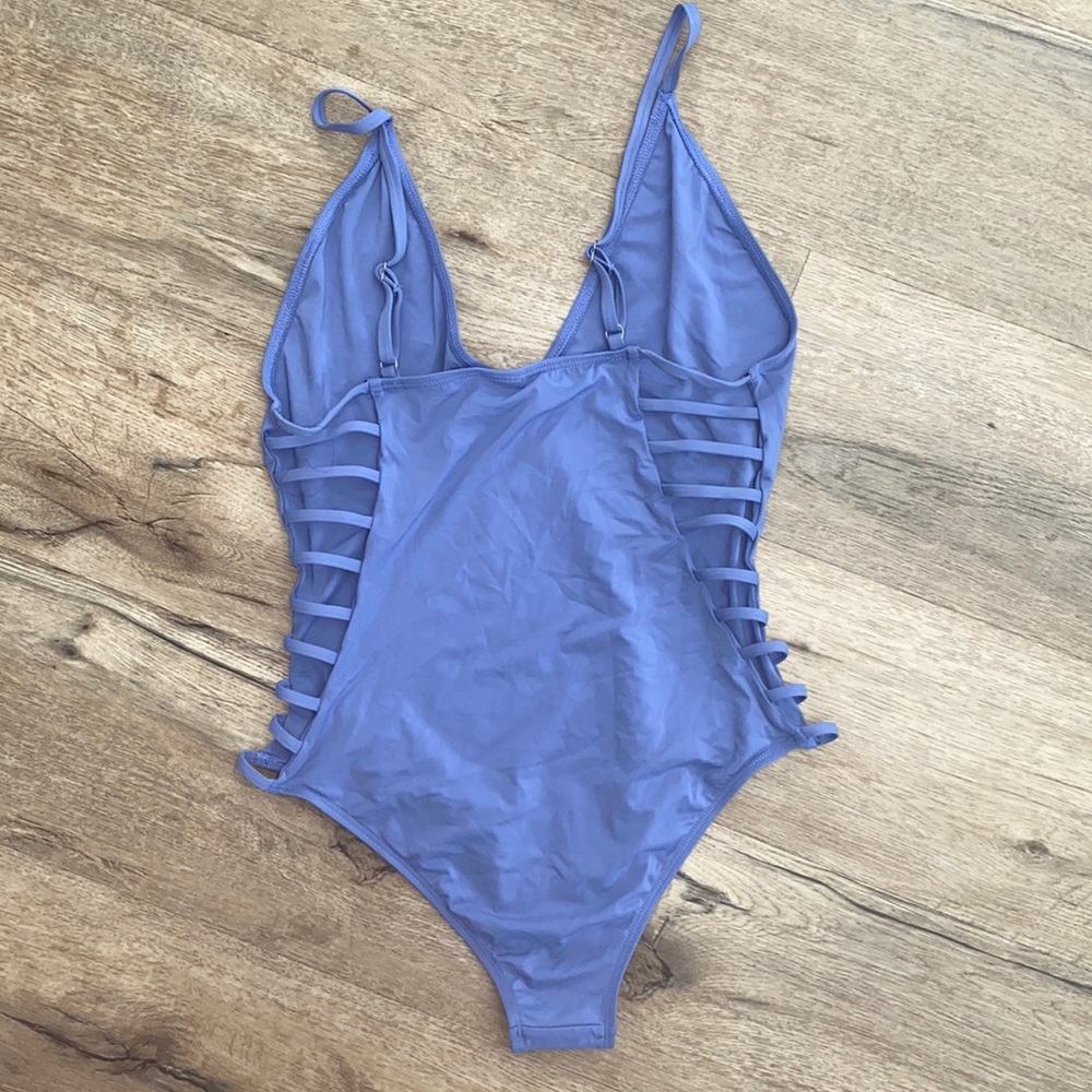Periwinkle blue one piece - open sides